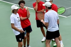The Trojan and Tiger singles players talking about the condition of the courts