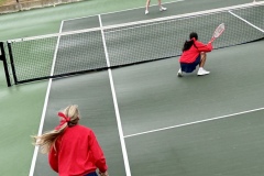 Wise thinking by Abby Tacbianan as she ducks to avoid interfering with Dender's shot