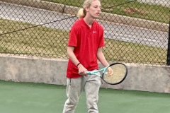 Josiah Rainey during a match at the region tournament