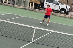 Carter McDaniel during a match against a doubles team from Temple