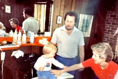 William Tuttle getting his first haircut with Lisa and Billy