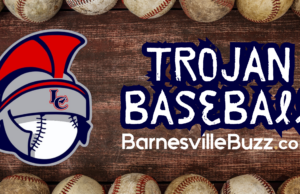 Trojans Sink Vikings in Extra-Innings Explosion, 21-9