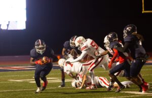 Halloween Havoc: Trojans and Hurricanes Battle for the Region Crown in Monticello
