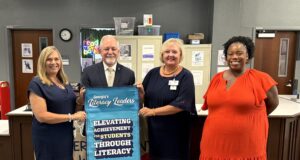 State Superintendent Richard Woods Honors Lamar County High School with Literacy Leader Banner