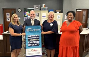 State Superintendent Richard Woods Honors Lamar County High School with Literacy Leader Banner