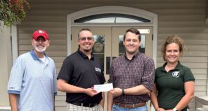 Barnesville-Lamar Chamber Delivers Fire Relief Checks to Businesses Impacted by Market Street Fire