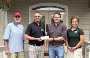 Barnesville-Lamar Chamber Delivers Fire Relief Checks to Businesses Impacted by Market Street Fire